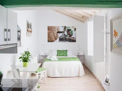 Cama o camas de una habitación en La Casa de la Costurera