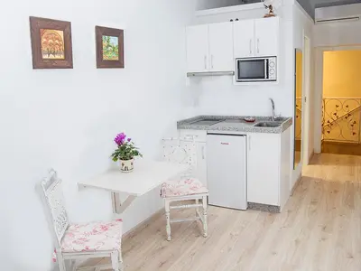 Una cocina o zona de cocina en La Casa de la Costurera