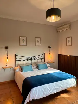 Cama o camas de una habitación en Complejo Rural Mirador de la Alcaidía