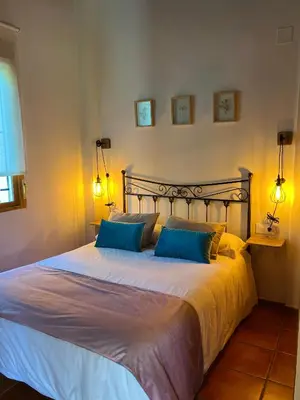Cama o camas de una habitación en Complejo Rural Mirador de la Alcaidía