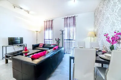 Una televisión o centro de entretenimiento en Apartamento La Salle