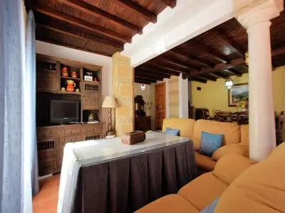 Una televisión o centro de entretenimiento en Holiday Home in Zagrilla Alta with Pool