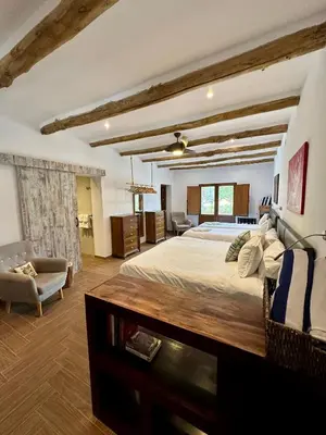 Cama o camas de una habitación en El Amparo