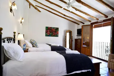 Cama o camas de una habitación en El Amparo
