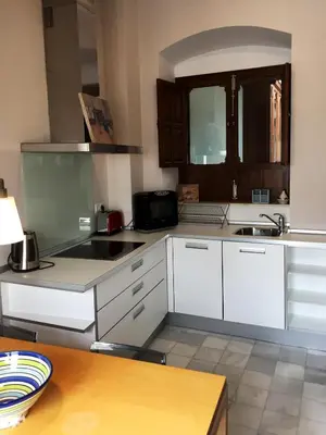 Una cocina o zona de cocina en 19th Century Sevillian Apartment