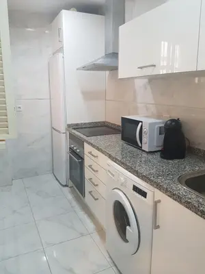 Una cocina o zona de cocina en Apartamento Barrio Santa Cruz