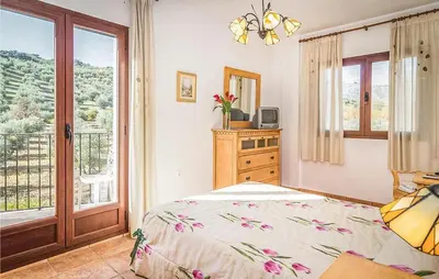 Cama o camas de una habitación en Spacious villa with private pool near Priego de Cordoba