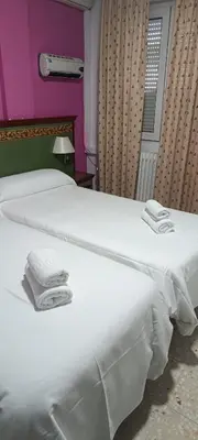 Cama o camas de una habitación en Hotel Logasasanti