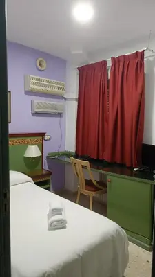 Cama o camas de una habitación en Hotel Logasasanti