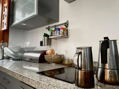 Una cocina o zona de cocina en Casa Vacacional Alcazabilla