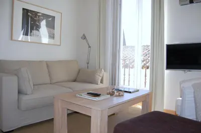 Una televisión o centro de entretenimiento en Coqueto Apartmento Centro - San Julián