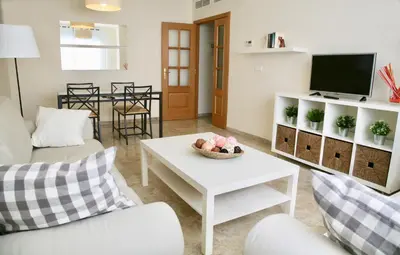 Una televisión o centro de entretenimiento en Apartamento Ollerías, 31