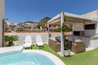Piscina en o cerca de Atico Iluro