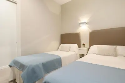 Cama o camas de una habitación en Conde de Gondomar 1