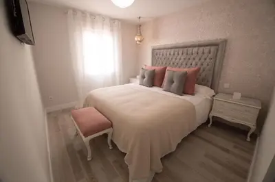 Cama o camas de una habitación en Apartamento El Balcon de la Muralla