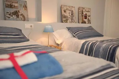 Cama o camas de una habitación en Noches de ensueño