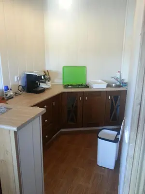 Una cocina o zona de cocina en Bungalow Perotonar Ideal Para Familia Con Niños