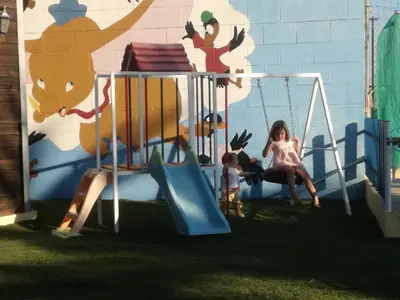 Zona de juegos infantil en Bungalow Perotonar Ideal Para Familia Con Niños
