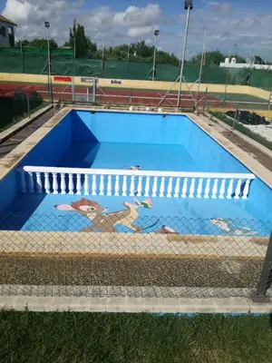 Piscina en o cerca de Bungalow Perotonar Ideal Para Familia Con Niños