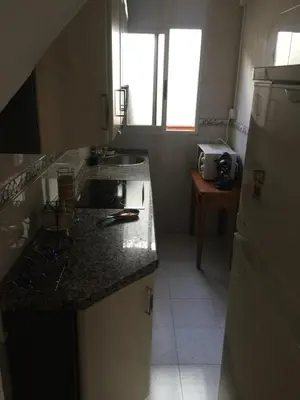 Una cocina o zona de cocina en El Cordobes