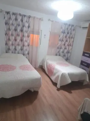 Cama o camas de una habitación en El Cordobes