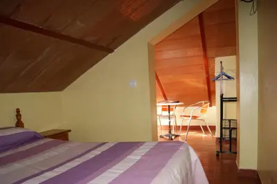 Cama o camas de una habitación en Hostal Alcazar I