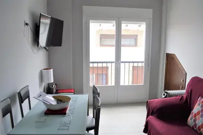 Una televisión o centro de entretenimiento en Apartamento Prado - Casa Eva