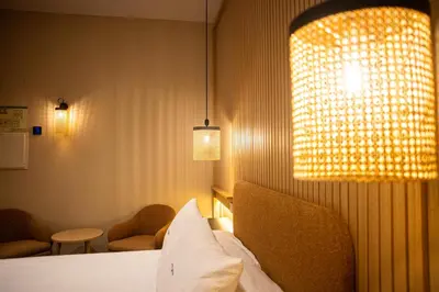 Cama o camas de una habitación en Hotel Macami