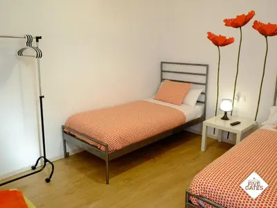 Cama o camas de una habitación en Hostal Five Gates