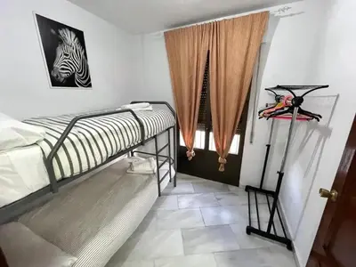 Cama o camas de una habitación en Comfortable House in Córdoba, ideal for families and friends