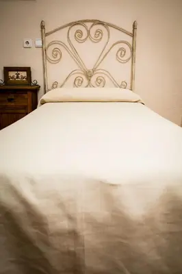 Cama o camas de una habitación en Hostal Restaurante El Paso
