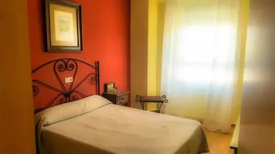 Cama o camas de una habitación en Hostal Restaurante El Paso