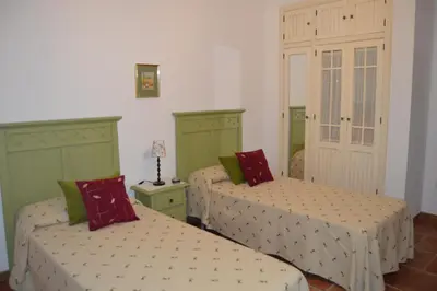 Cama o camas de una habitación en El Olivo del Moreno