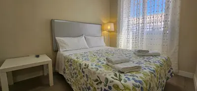 Cama o camas de una habitación en Manzil Cordoba
