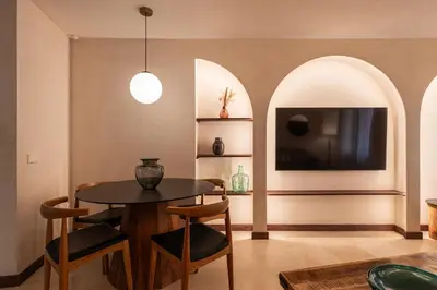 Una televisión o centro de entretenimiento en Apartamentos La Vistosona