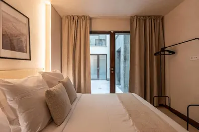Cama o camas de una habitación en Apartamentos La Vistosona
