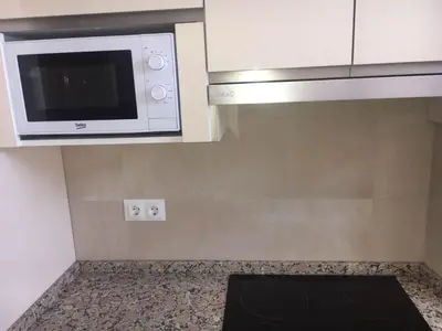 Una cocina o zona de cocina en Apartamento el Torreón