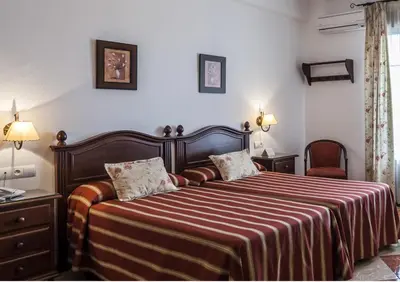 Cama o camas de una habitación en Hotel El Molino