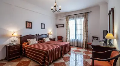 Cama o camas de una habitación en Hotel El Molino