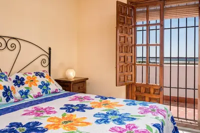 Cama o camas de una habitación en La torre Casa rural