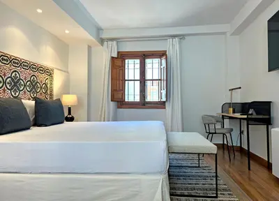Una televisión o centro de entretenimiento en Soho Boutique Hospedería del Atalia