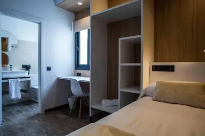 Cama o camas de una habitación en Hostal Sevilla Santa Justa - Adults only