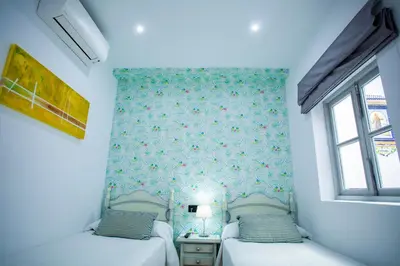 Cama o camas de una habitación en Hostal San Francisco