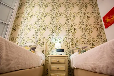 Cama o camas de una habitación en Hostal San Francisco