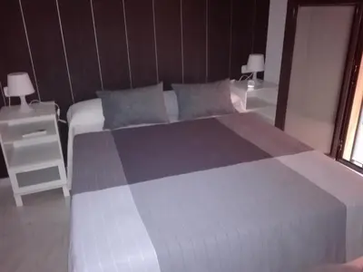Cama o camas de una habitación en Apartamento duplex en centro de Sevilla