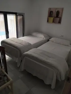 Cama o camas de una habitación en Apartamento duplex en centro de Sevilla