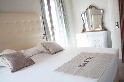 Cama o camas de una habitación en La Casa De Maria