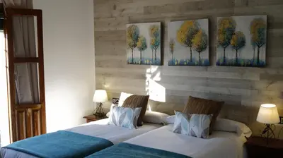 Cama o camas de una habitación en Caserio de Iznájar