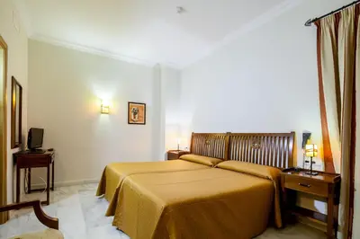 Cama o camas de una habitación en Hotel Las Casas del Duque
