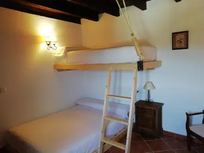 Cama o camas de una habitación en Cortijo Las Monjas